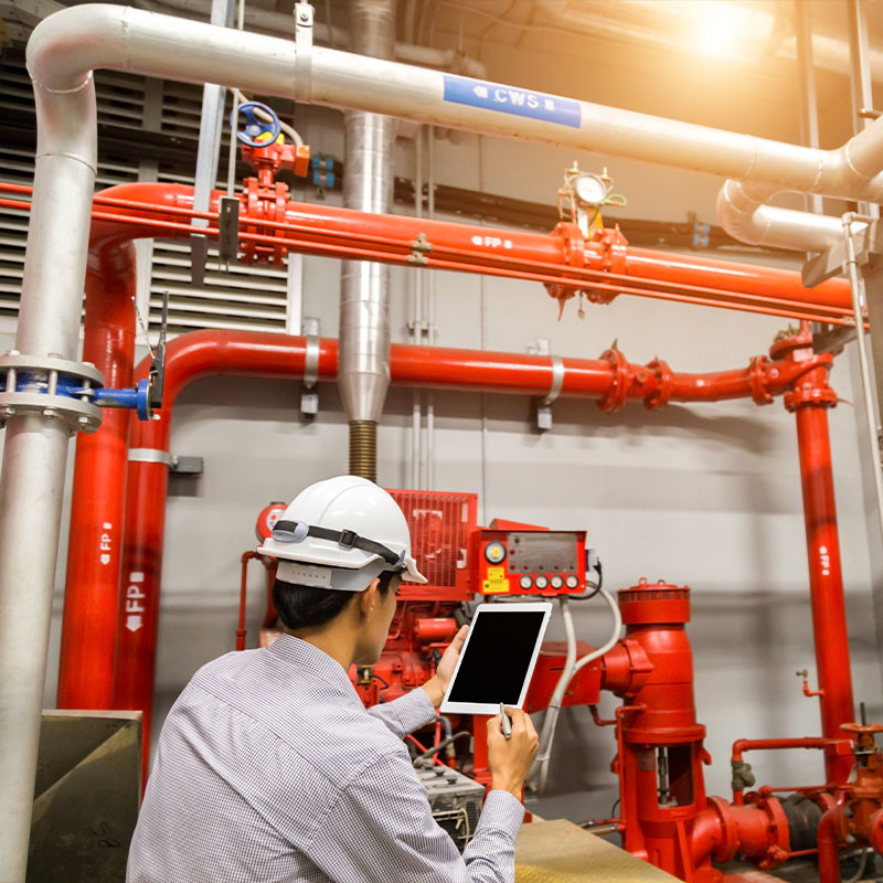 Person checking safety protocol on tablet